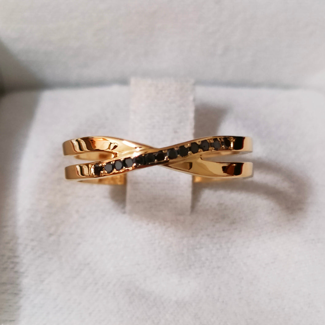 Intreccio oro giallo e diamanti neri